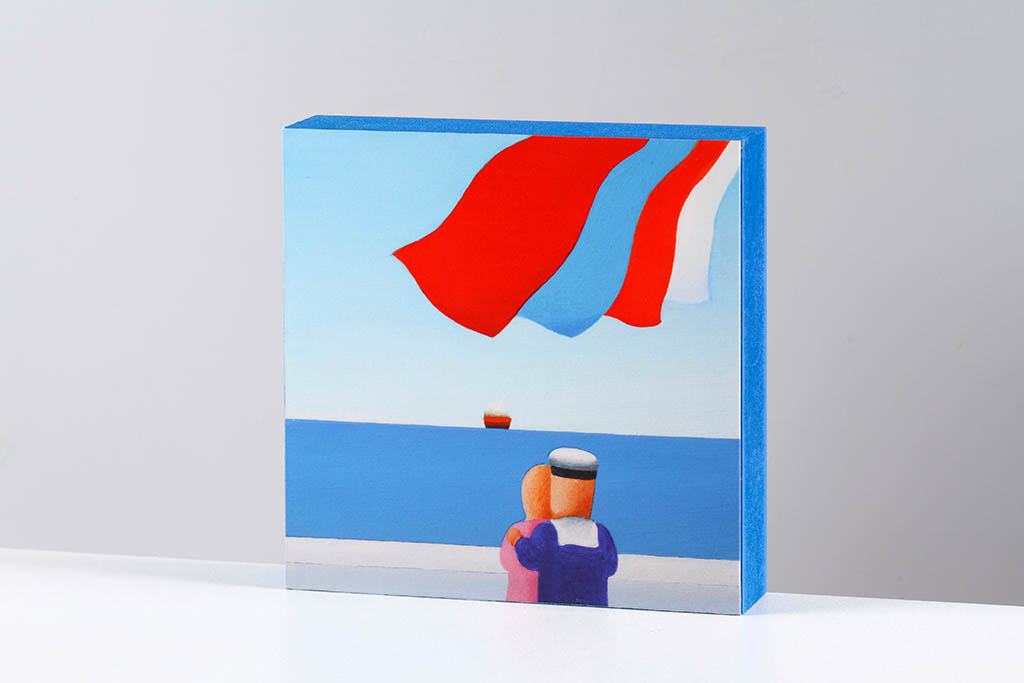 Small island artwork with a couple looking toward the sea