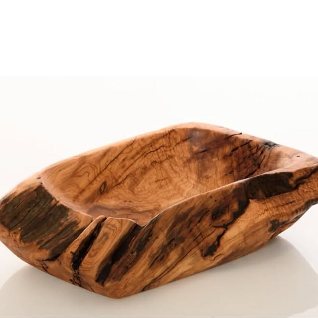 Hand-carved wooden bowl with visible natural grain